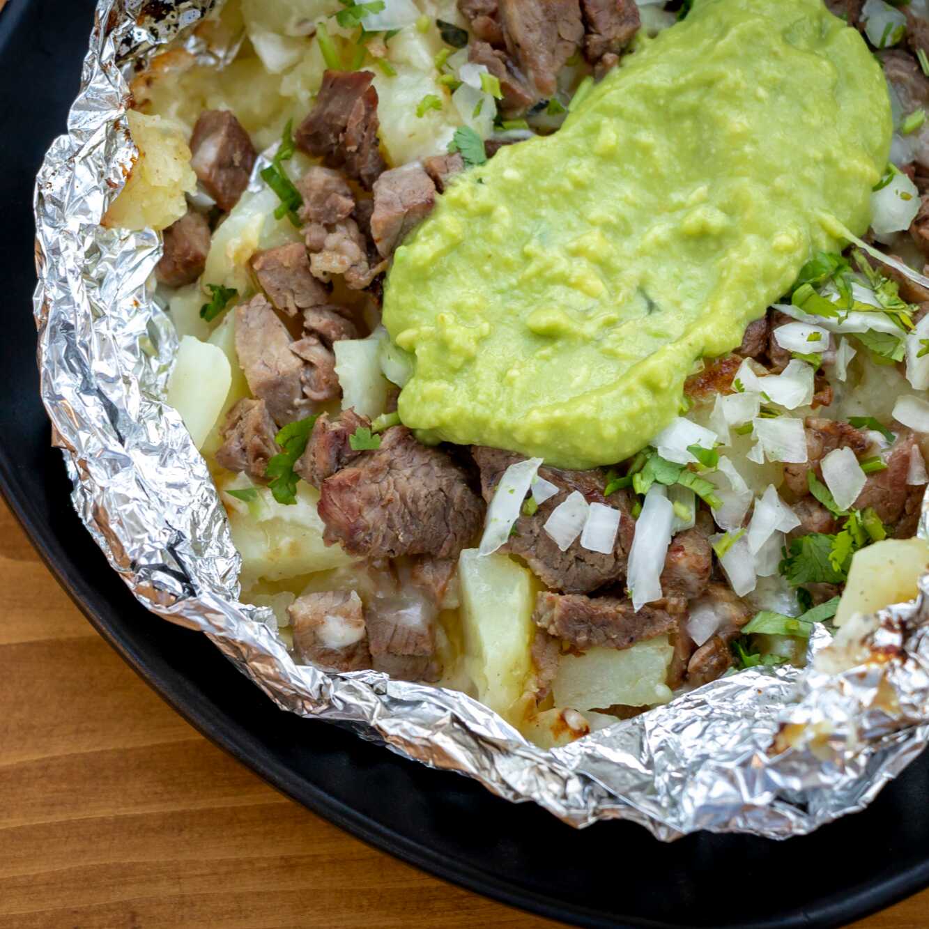 Papa Rellena con Queso y Asada Sirloin Norteño