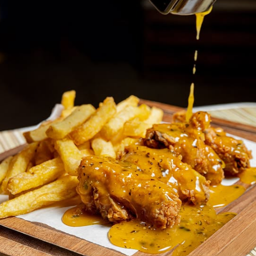 Alitas Maracuyá + Papas fritas