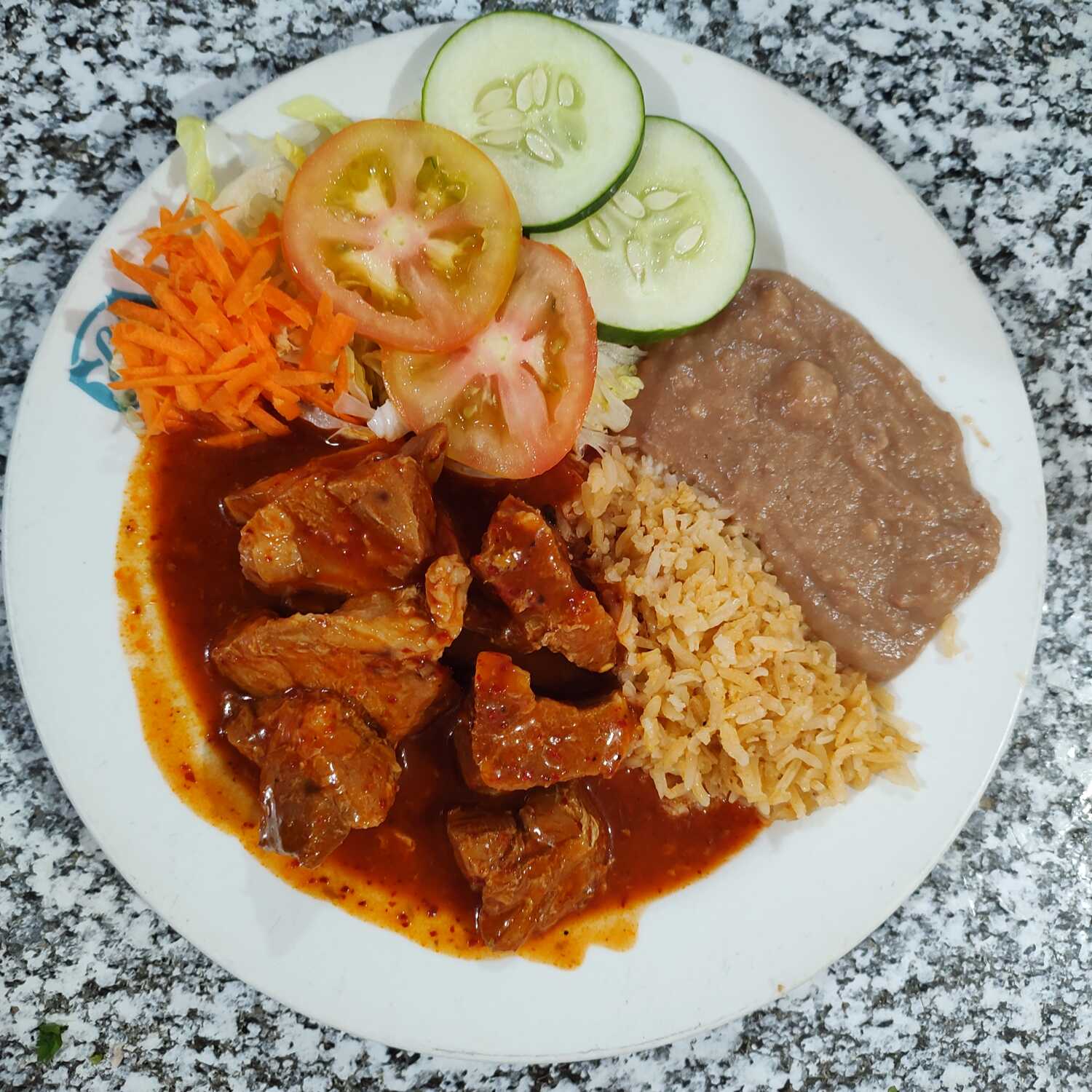 GUISADO DE PUERCO EN SALSA ROJA