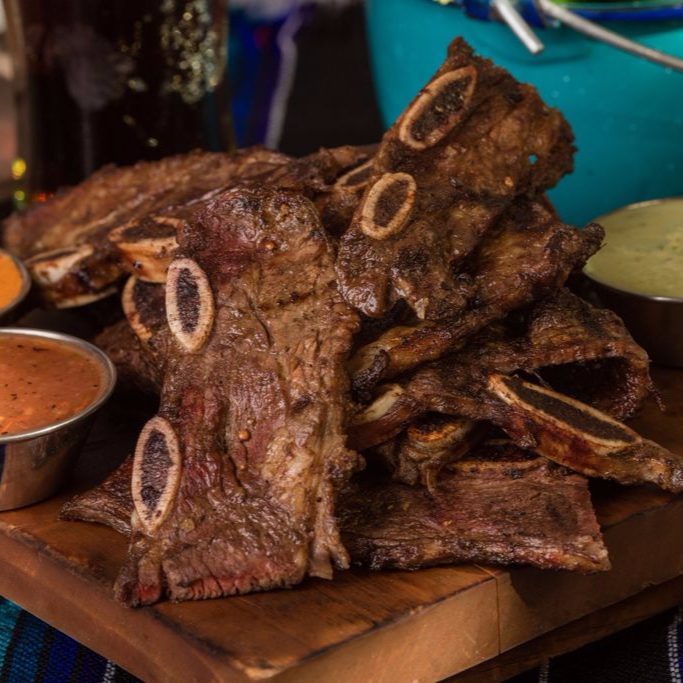1/2 Kilo de Costilla+Guarnicion+Bebida
