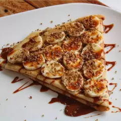 Crepa Cajeta Nuez y platano más Capuccino