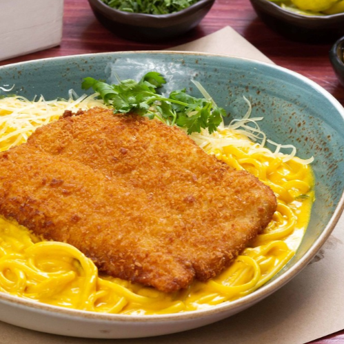 Tallarin a la Huancaina con Chuleta o Milanesa