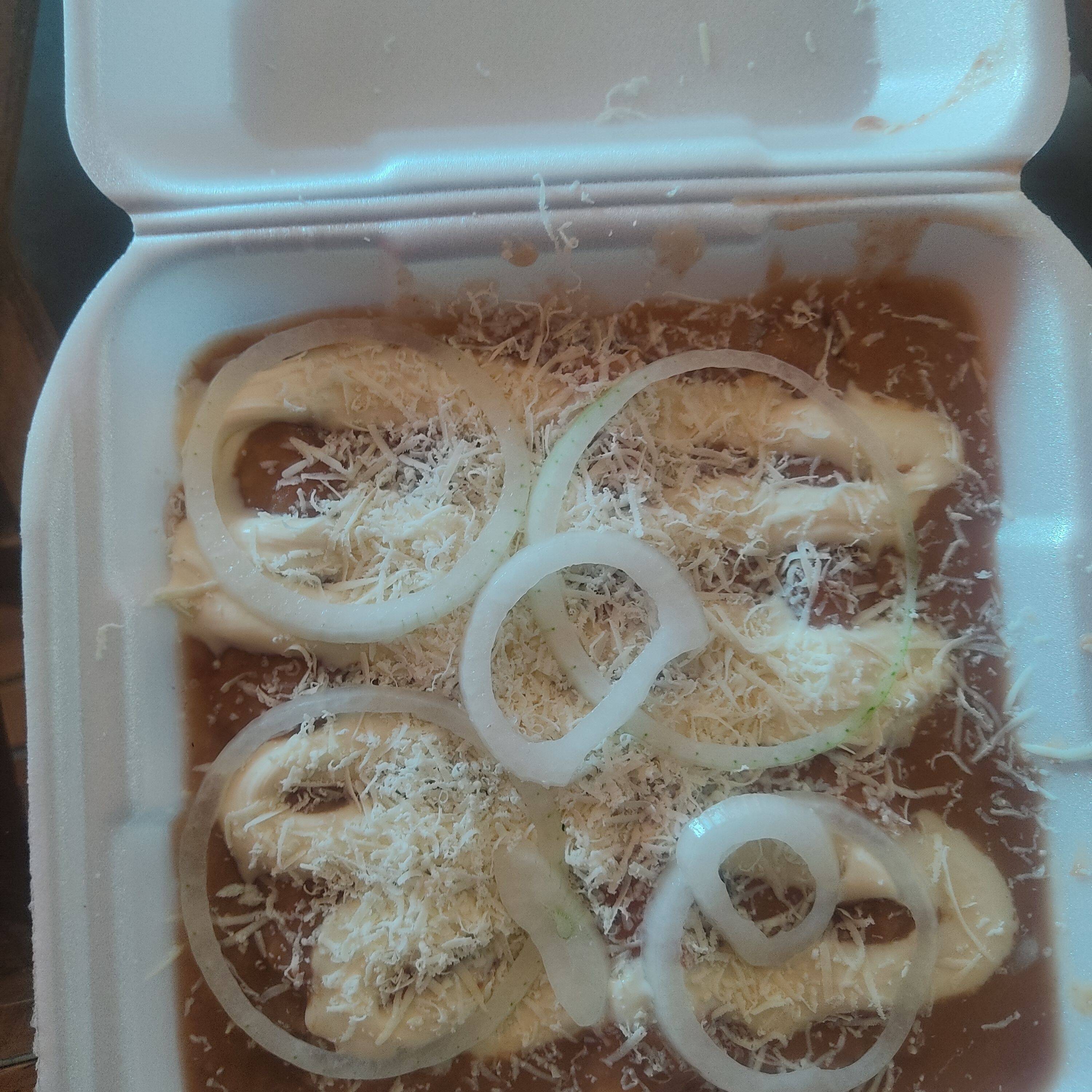 Enfrijoladas + vaso de agua del día