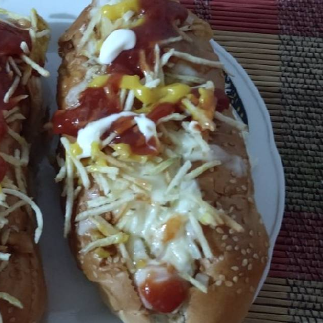 2 Perros Calientes + Coca Cola 355ml
