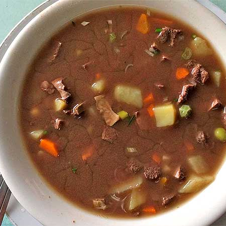 Caldo De Pajarilla con Arepitas