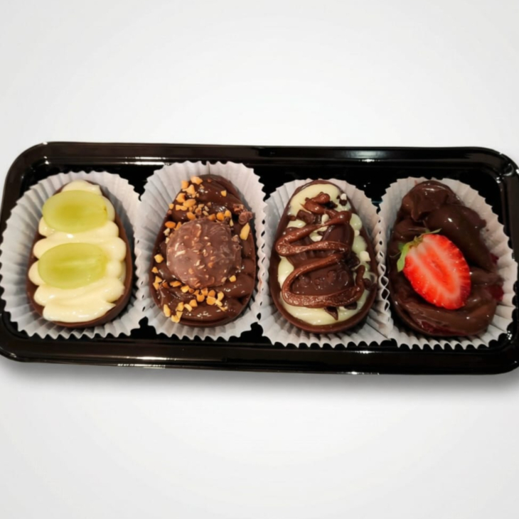 Box degustação com 4 ovinhos sendo 1 - Surpresinha de uva 2 - Ferrero Rocher 3- Ninho com creme de avelã 4 - Brigadeiro com geléia de morango #pascoa2026 #dicasdepascoa #foodporn #instafood #gastronomia #unboxing #reelsdepascoa #ideiasdepascoa #chocolatelovers #ovodepascoagourmet #ovodecolher #amochocolate #docesdecorados #sobremesadepascoa