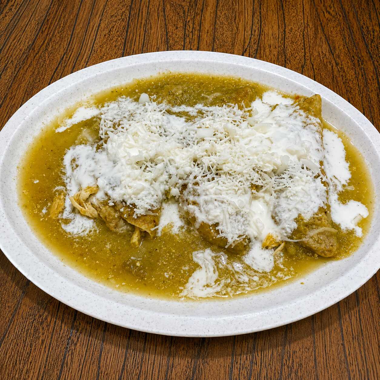 Enchiludas Verdes o Rojas Rellenas de Pollo