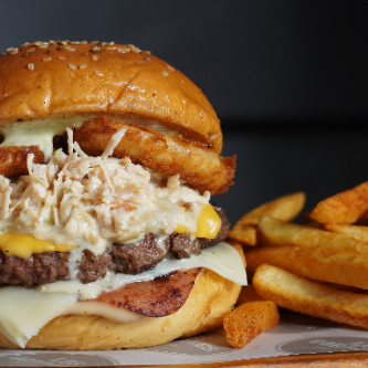 Hamburguesales La Traviesa + Papas