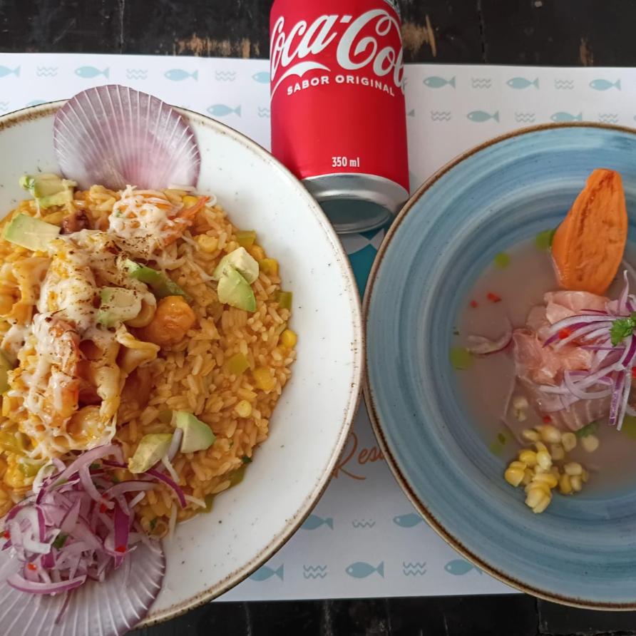 Arroz com frutos do mar+ ceviche clássico 80gr+ 1 refrigerante (lata) de sua escolha: coca normal, coca zero, Guaraná zero ou Guaraná normal.