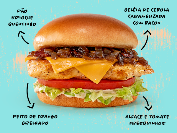 Nosso muso fitness! Frango grelhado com cerca de 115g, servido com alface, tomate, maionese defumada, queijo tipo cheddar e geleia de cebola caramelizada com bacon, no pão tipo brioche. A pimentinha é bem leve!