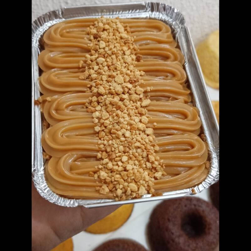 Brownie delicioso,cremoso com uma camada de doce de leite