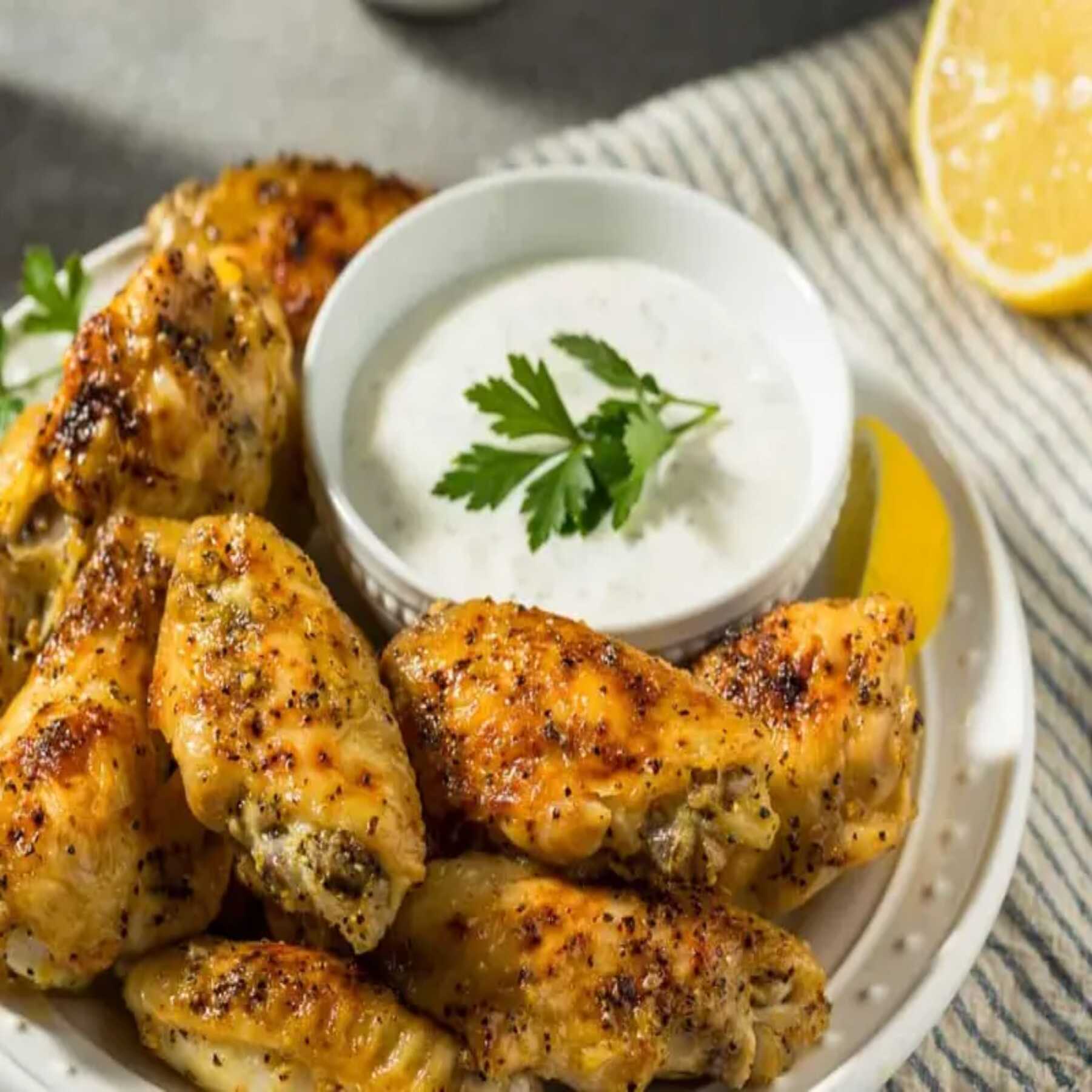 600g de alitas con salsa lemon pepper