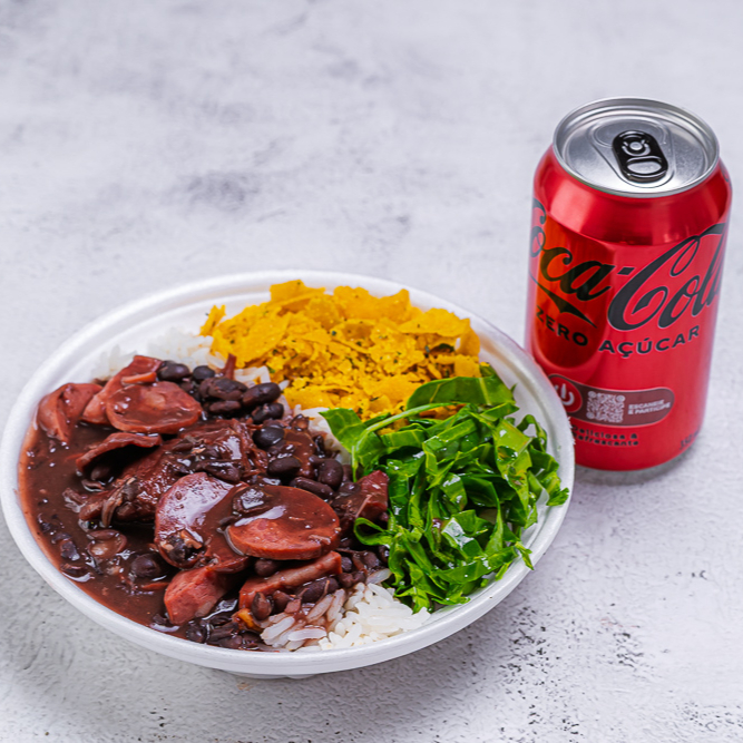 Marmita feijoada magra individual (costelinha, lombo, linguiça calabresa, paio, bacon), acompanha arroz branco, couve e farofa + Coca Zero Lata. Marmita Indicada para 01 pessoa - peso médio 400 Gramas.