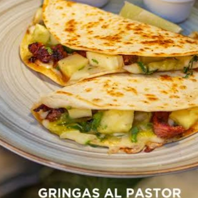 La Gringa con Carne al Pastor la pieza
