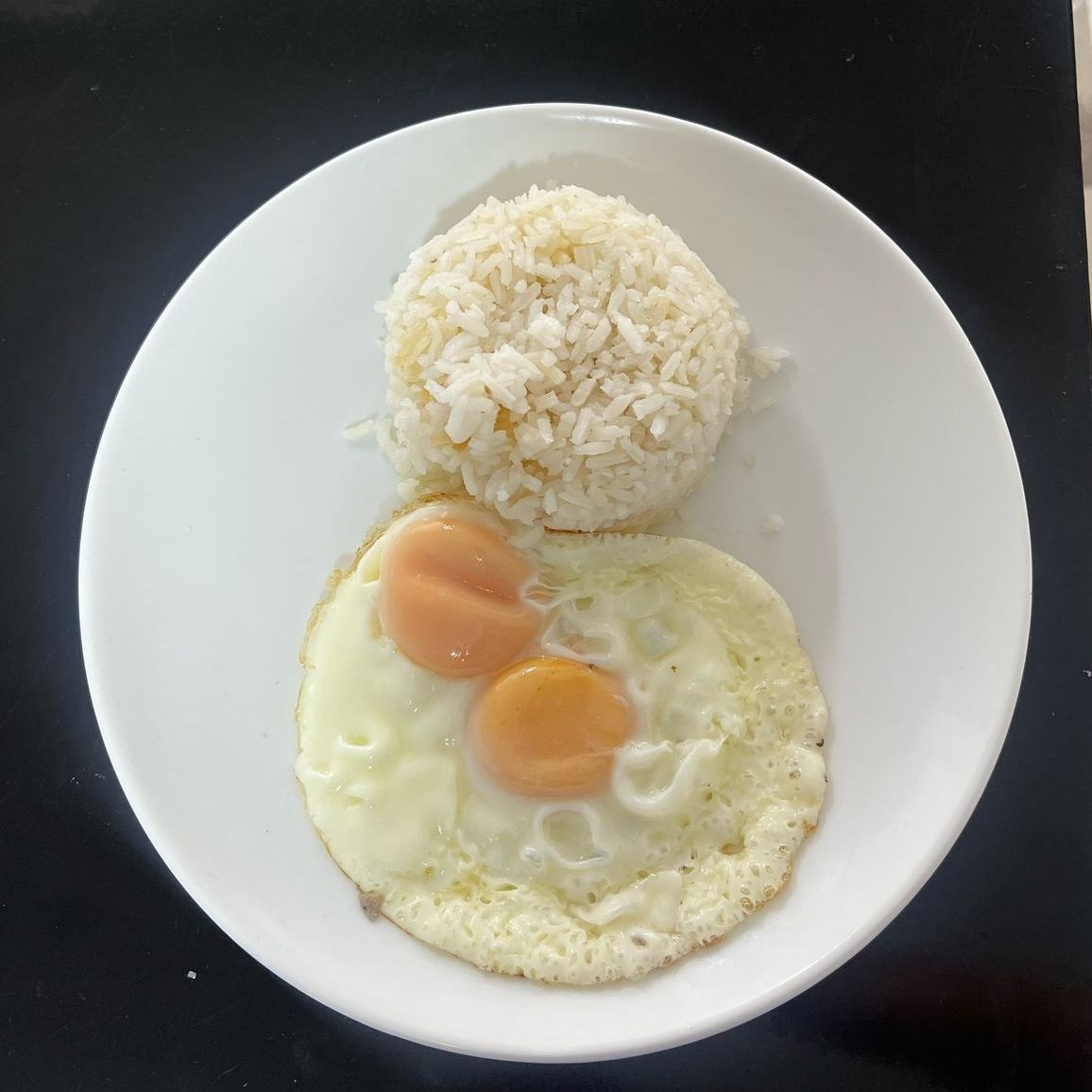 Huevo al Gusto Con Arroz Fritos