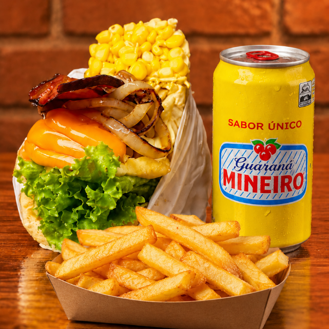 1 X-Tudo (pão, burguer, bacon, salsicha, ovo, queijo, presunto, abacaxi, milho, batata e salada), acompanhado de batata 150g e 1 guaraná 269ml. Uma combinação caprichada para matar a fome!