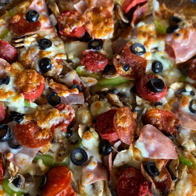 Pizza premium individual (elije 1 especialidad)