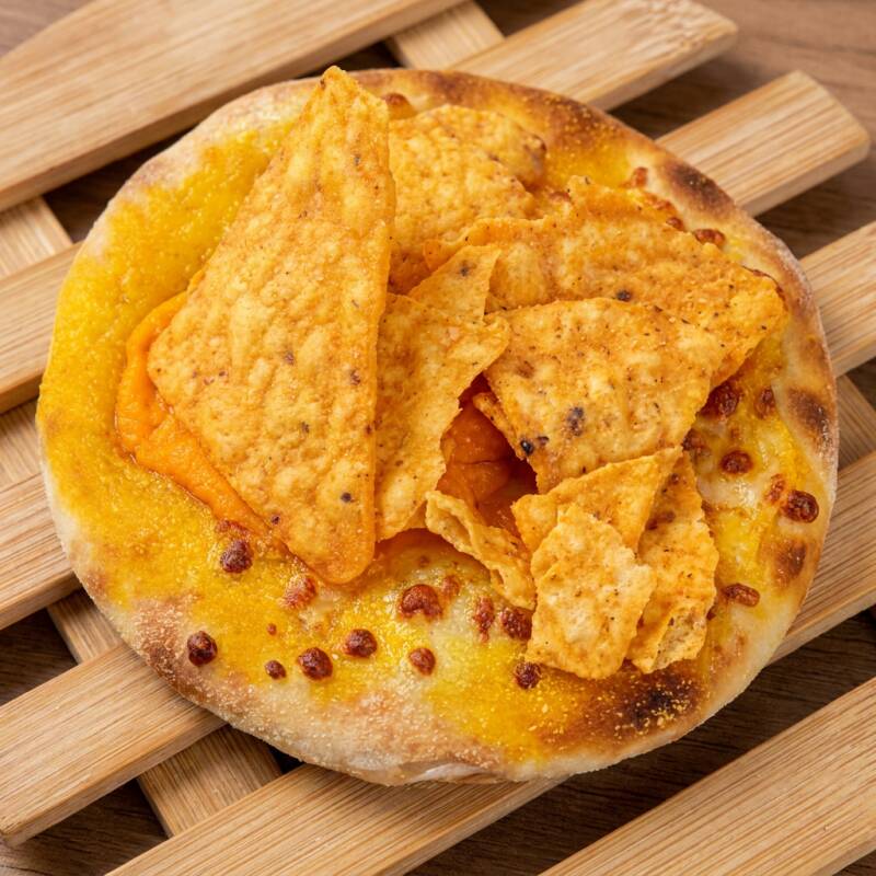 Ingredientes
Base de muçarela, cheddar e Doritos por cima