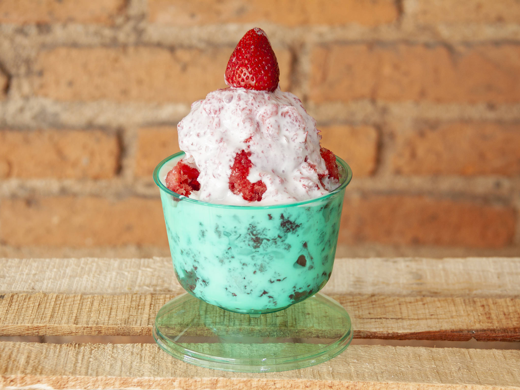 Fresas congeladas con crema de la casa...
