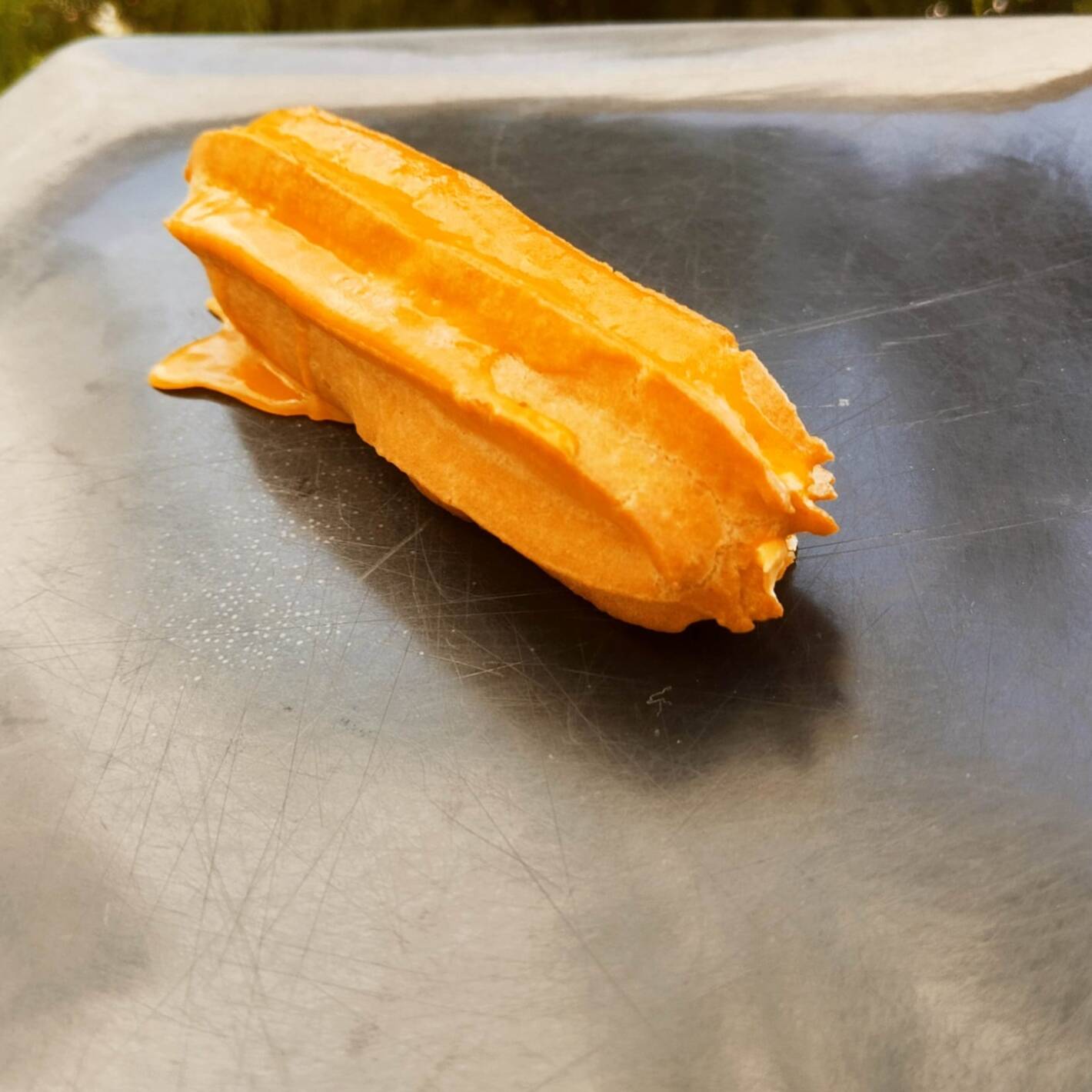 Eclair de Naranja con Chocolate Blanco