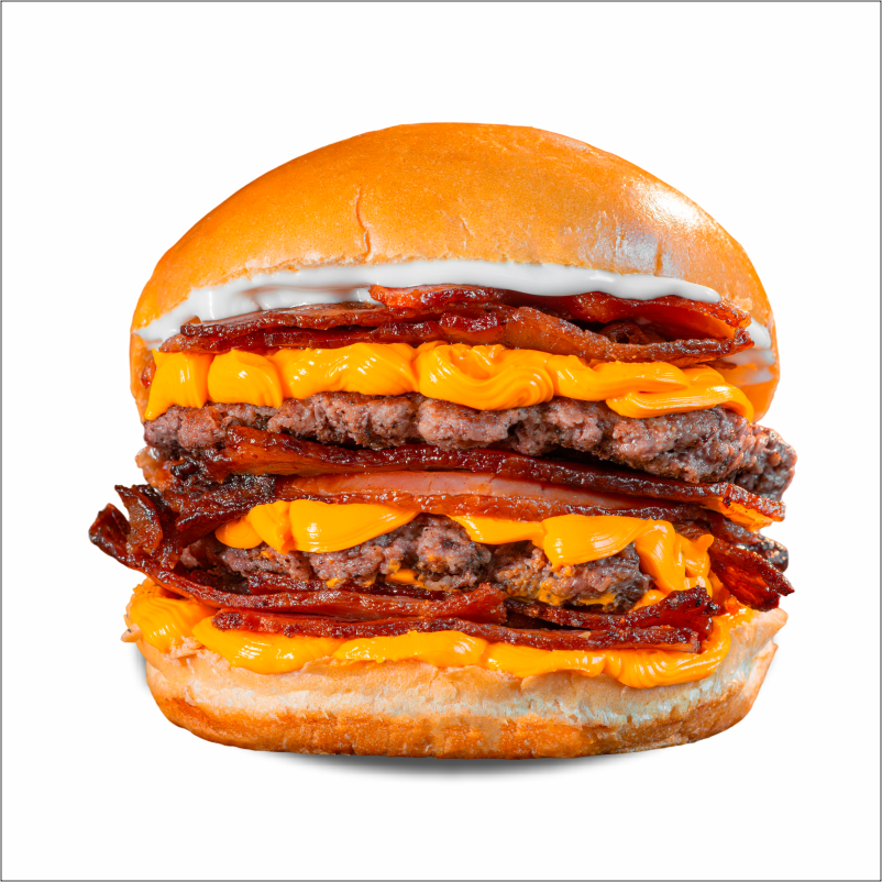 Pão de brioche, 2x bacon, 2x cheddar cremoso, maionese Hakuna e duplo burguer smash 70g.