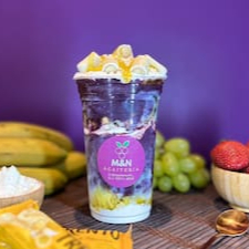 Copo 500ml + açaí, leite condensado, leite em pó, calda de maracuja e trento de maracuja.