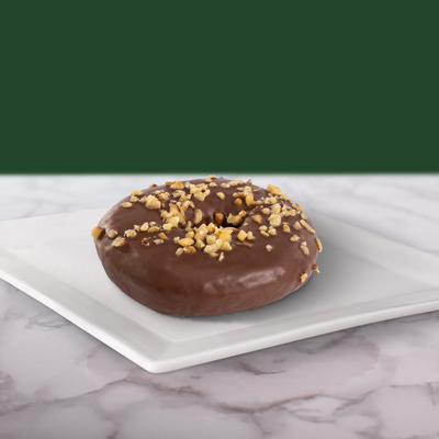 Dona de chocolate con topping de nuez