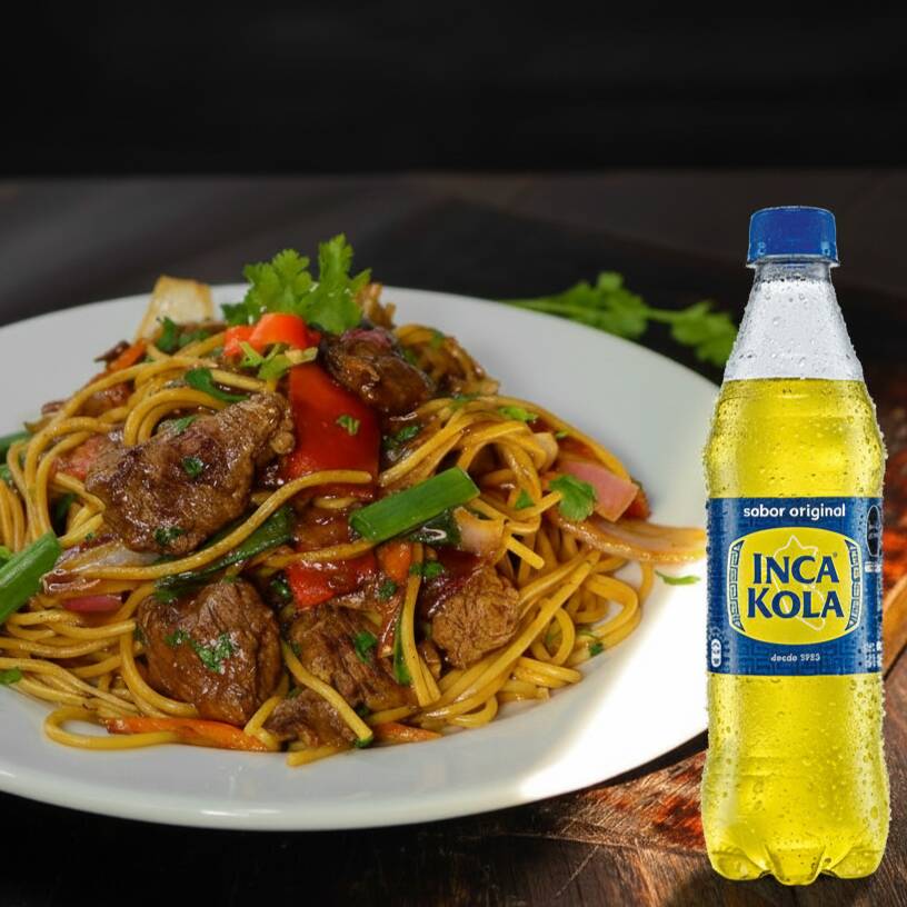 Tallarines Saltado con Carne+ Inca Kola 500 Ml