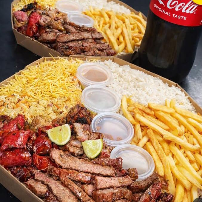 Churrasco misto,batata frita, salpicao,arroz,farofa, vinagrete e coca cola de 2l