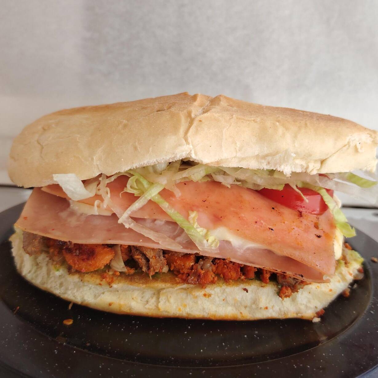 Torta Súper Combinada Adobada y Bistec