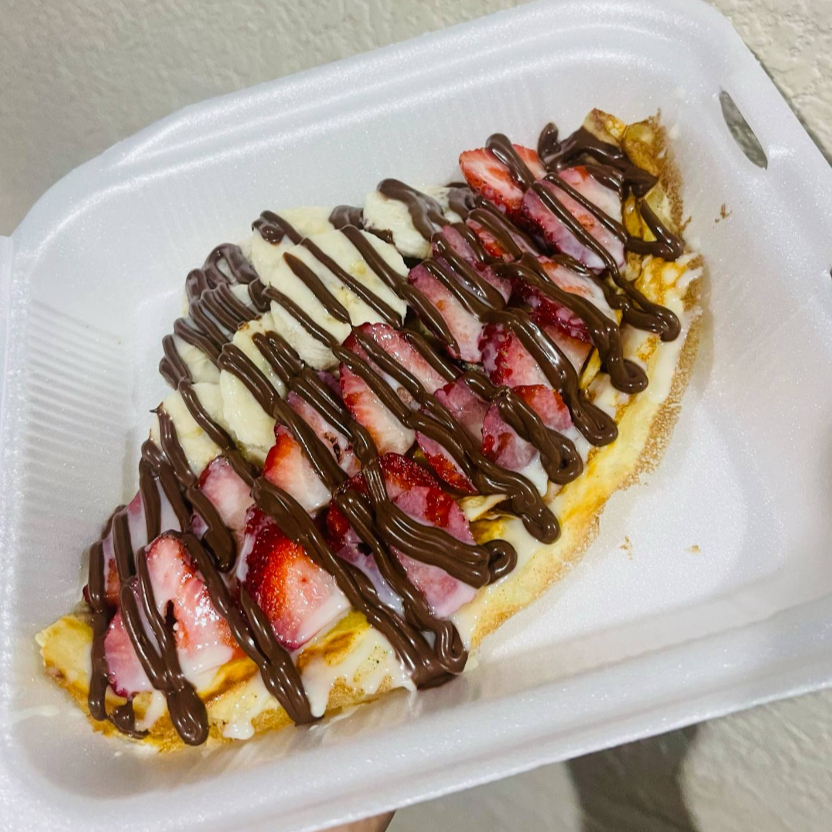 Crepa con Platano,fresa,nutella y Lechera