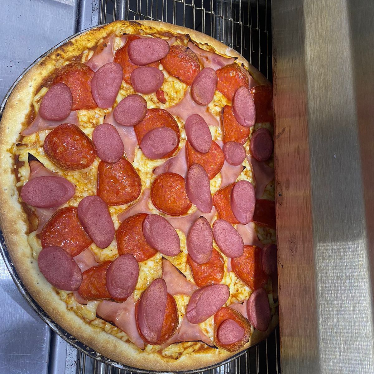 Pizza Tres Carnes