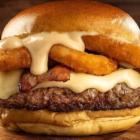 Pão, carne 160gr, queijo, molho barbecue, bacon, 3 anéis de cebola frito e molho especial.