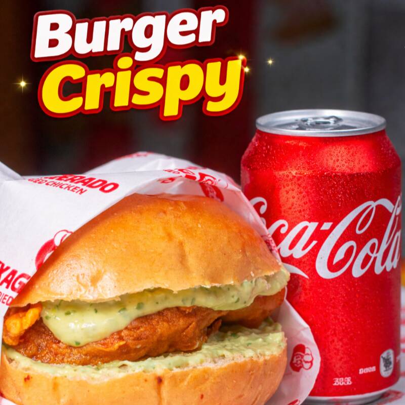 O 'Exagerado Burger Crispy' é uma verdadeira explosão de sabor e textura da categoria 'Sanduíches'. Este prato consiste em um suculento filé de peito, cuidadosamente empanado, proporcionando uma crocância irresistível. Acompanha uma generosa porção de maionese temperada que adiciona um toque especial e único ao sabor, tornando-o ainda mais surpreendente. Tudo isso é servido em um pão artesanal, macio e fresco, que casa perfeitamente com os demais ingredientes. Uma verdadeira obra-prima da culinária rápida, que irá agradar até os paladares mais exigentes.
