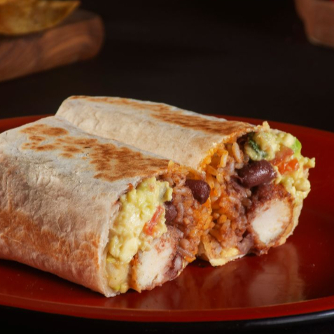 Arroz mexicano, feijão vermelho, guacamole, queijo derretido e proteína a sua escolha, tudo isso envolvido em uma tortilha de trigo selada.   Porção de aprox 200gr