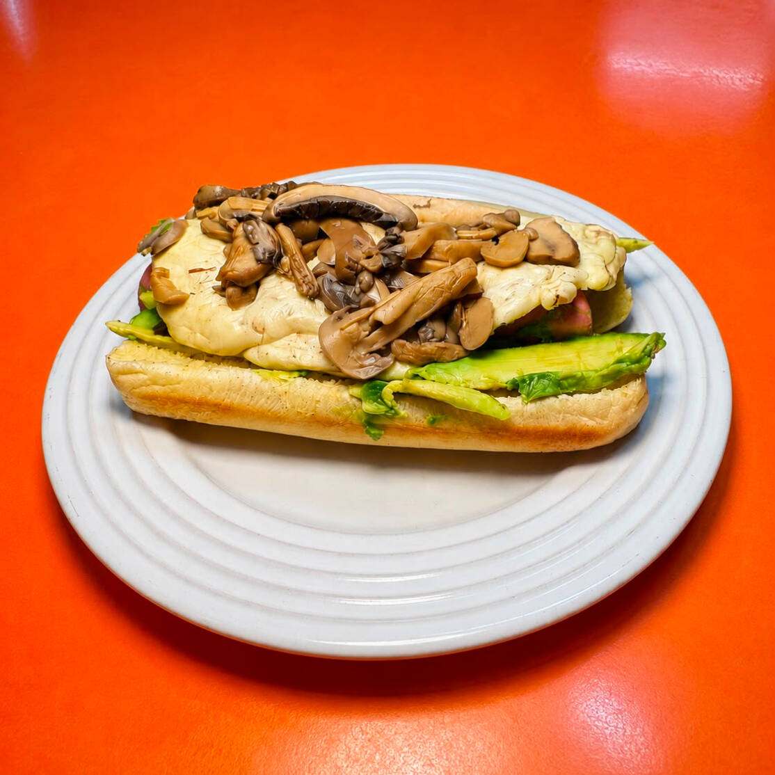 Hot Dog Quesillo y Champiñones