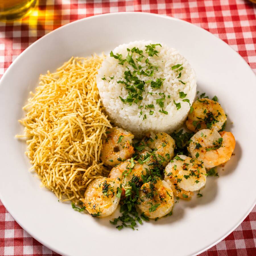 Acompanha arroz branco e batata Palha do Casquinha.