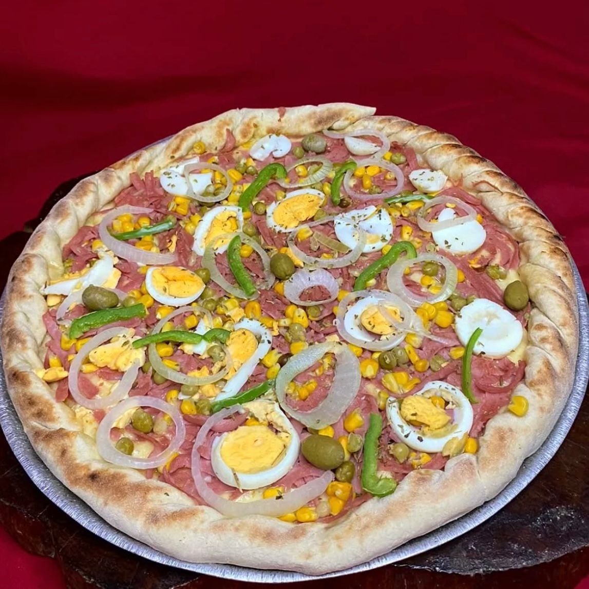 MUSSARELA,PRESUNTO,MILHO,ERVILHA,OVO,PIMENTÃO,CEBOLA,AZEITONA E ORÉGANO.