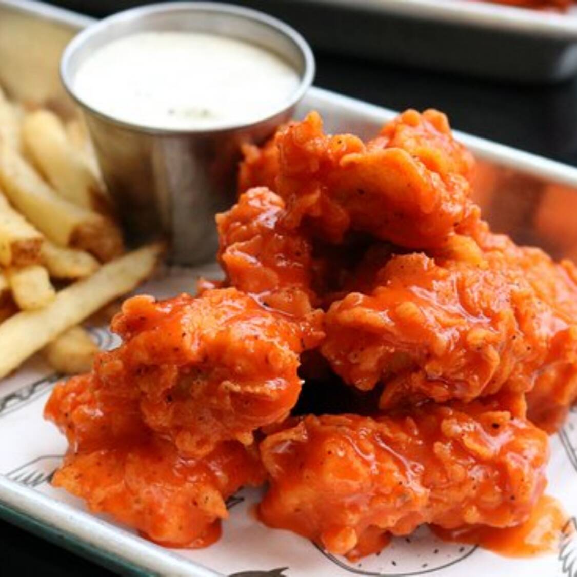 500 g Boneless Búfalo más Papas gratis