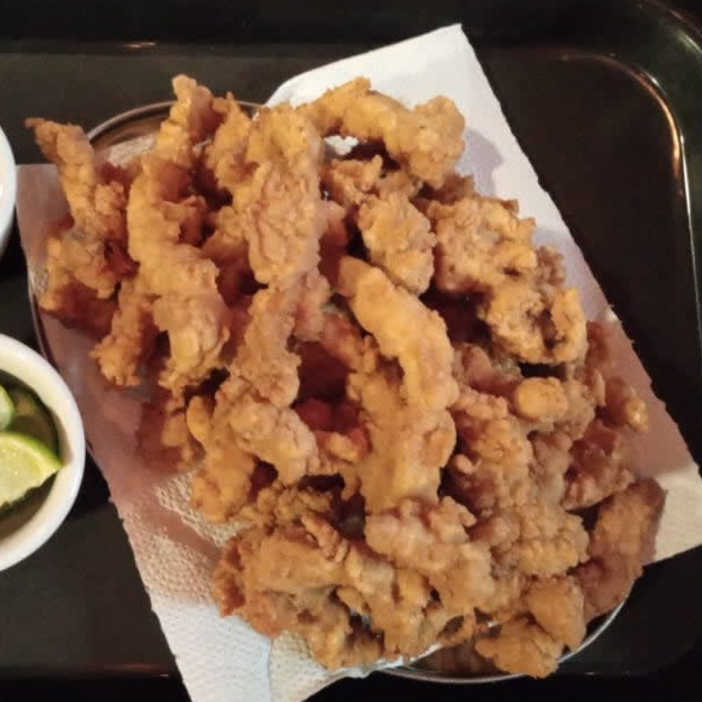 Filé me merlusa frito em tirinhas.
