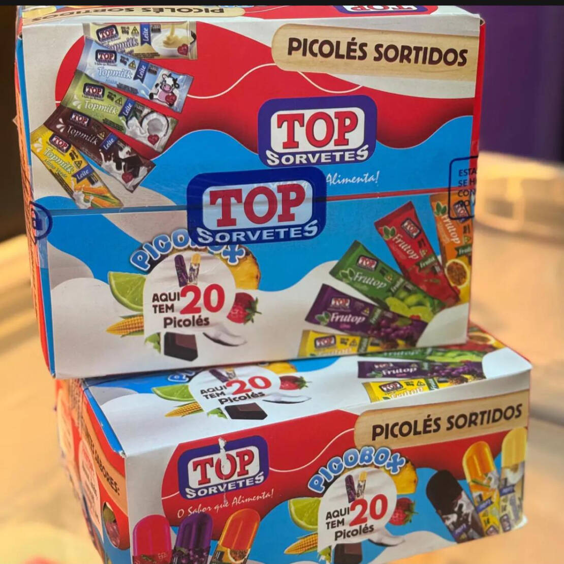 Caixa de 20un de picoles, sendo 10un de fruta e 10un de leite!!! A opção + que perfeita para se refrescar com a familia ou sozinha (o) ;)