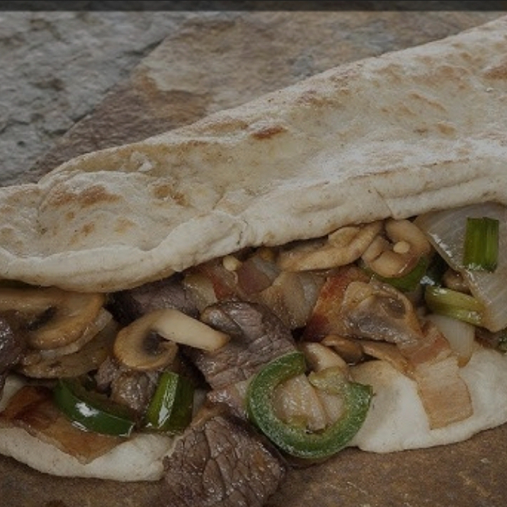 Taco con Pan Arabe con Deshebrada