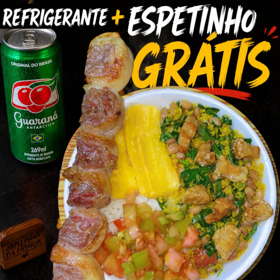 Jantinha completa acompanhada de arroz soltinho, mandioca cozida, vinagrete fresquinho, feijão tropeiro bem temperado e 1 espetinho grande à sua escolha. E ainda ganha refrigerante geladinho GRÁTIS! Serve 1 pessoa Marmita tamanho 500ml Refrigerante variado conforme disponibilidade da loja.