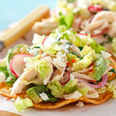 2 Tostadas de Pollo y Un Agua del Dia