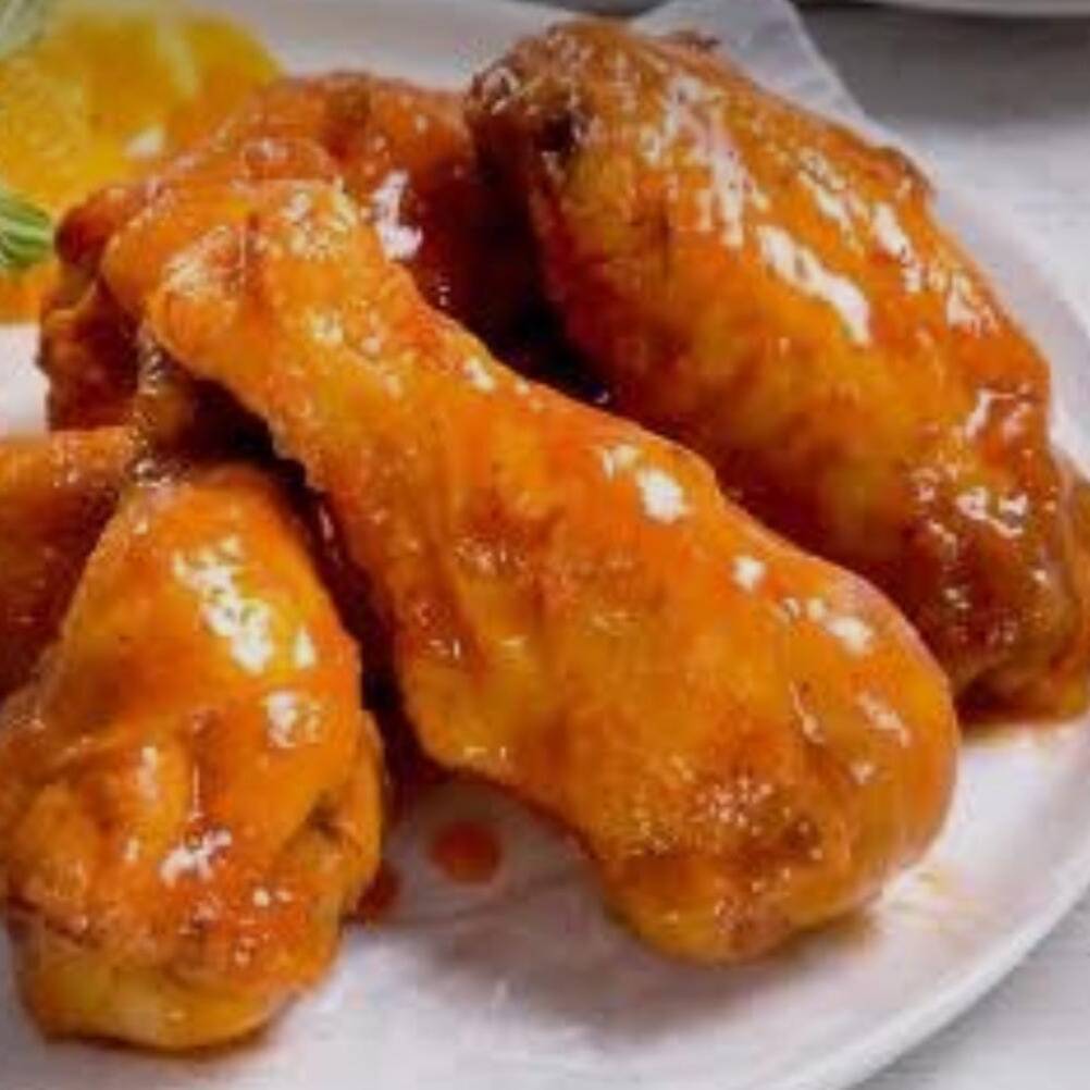 1/2 DE ALITAS EN SALSA MANGO HABANERO