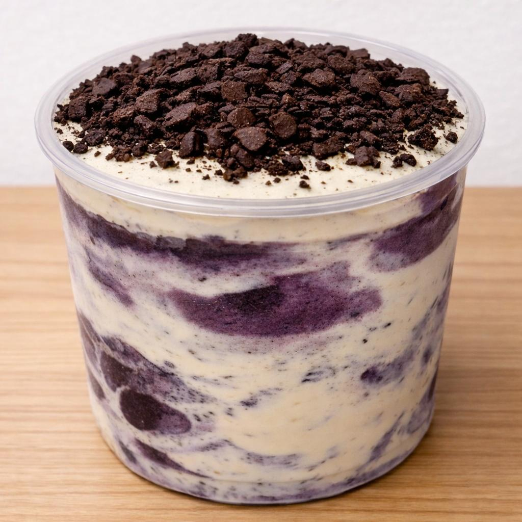 Potão de 1L com açaí cremoso, Creme de Ninho artesanal e pedaços crocantes de Oreo.