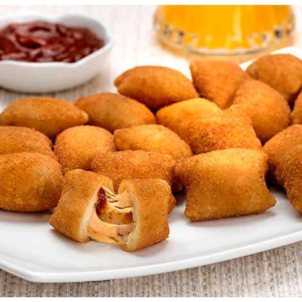 Risolis presunto e queijo. Salgado de 48 a 50gm