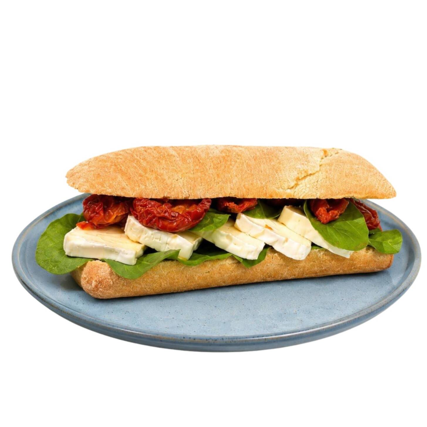 Ciabatta rústica de textura macia e casquinha levemente crocante, recheada com queijo branco, rúcula fresca e tomate seco.