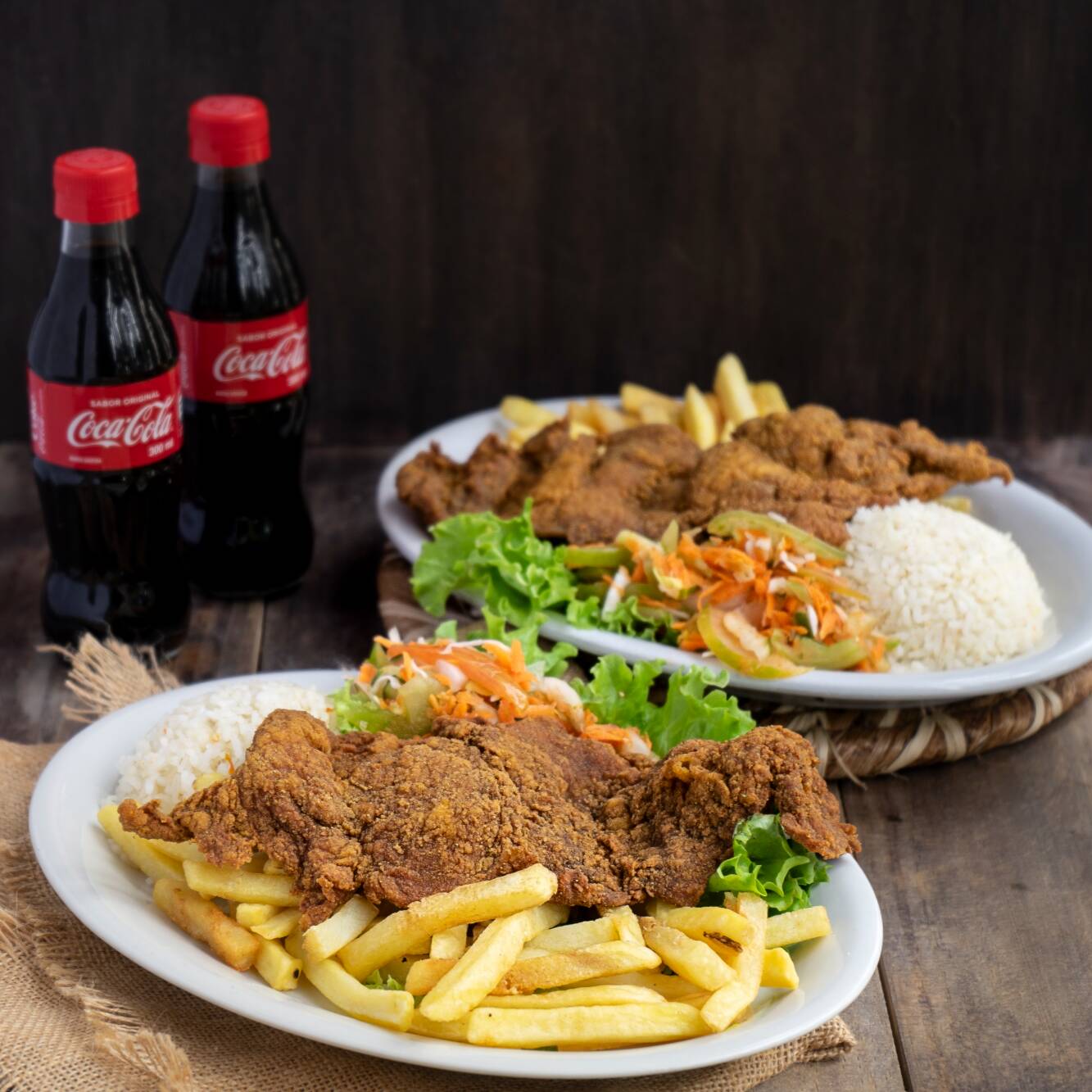 2 Combo Chuletas Vallunas Cerdo o Pollo y Cocacola