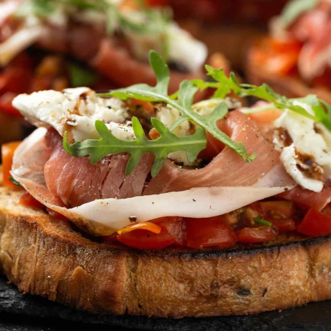 BRUSCHETTA DE JAMÓN SERRANO